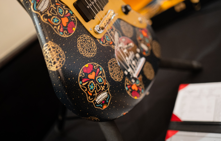 Detail of a Fender guitar by guitarist David Brown with illustrations by Sarah Gallenberger. | Photo: Martin Novotný