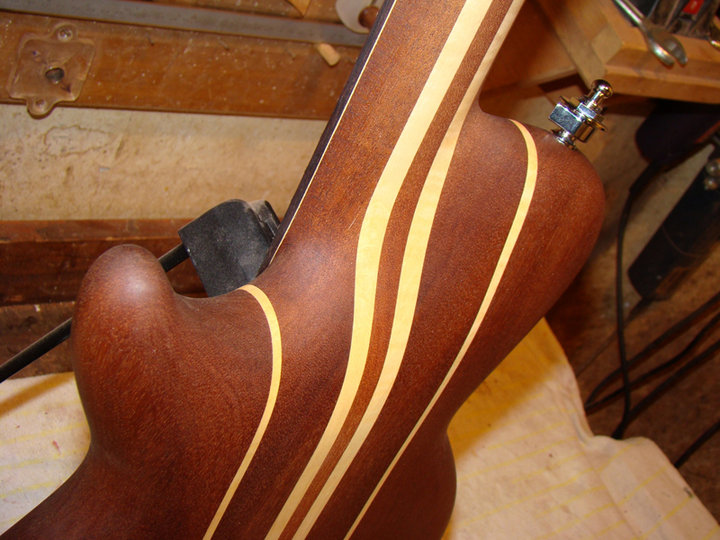Ergonomically designed transition of the neck to the instrument's body. l Source: Mázl Custom Guitars Facebook 