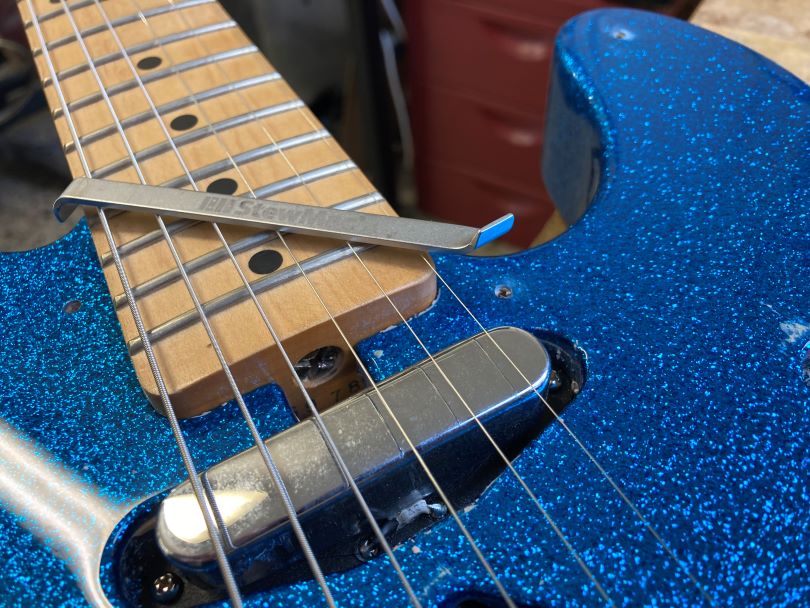 If you have a special wrench to adjust the bracing, there is no need to remove the neck from the body on modern Telecasters