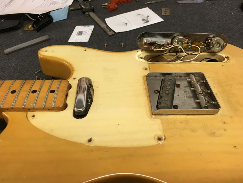 The classic shape of the bridge (ashtray) on a Telecaster from the 1970s