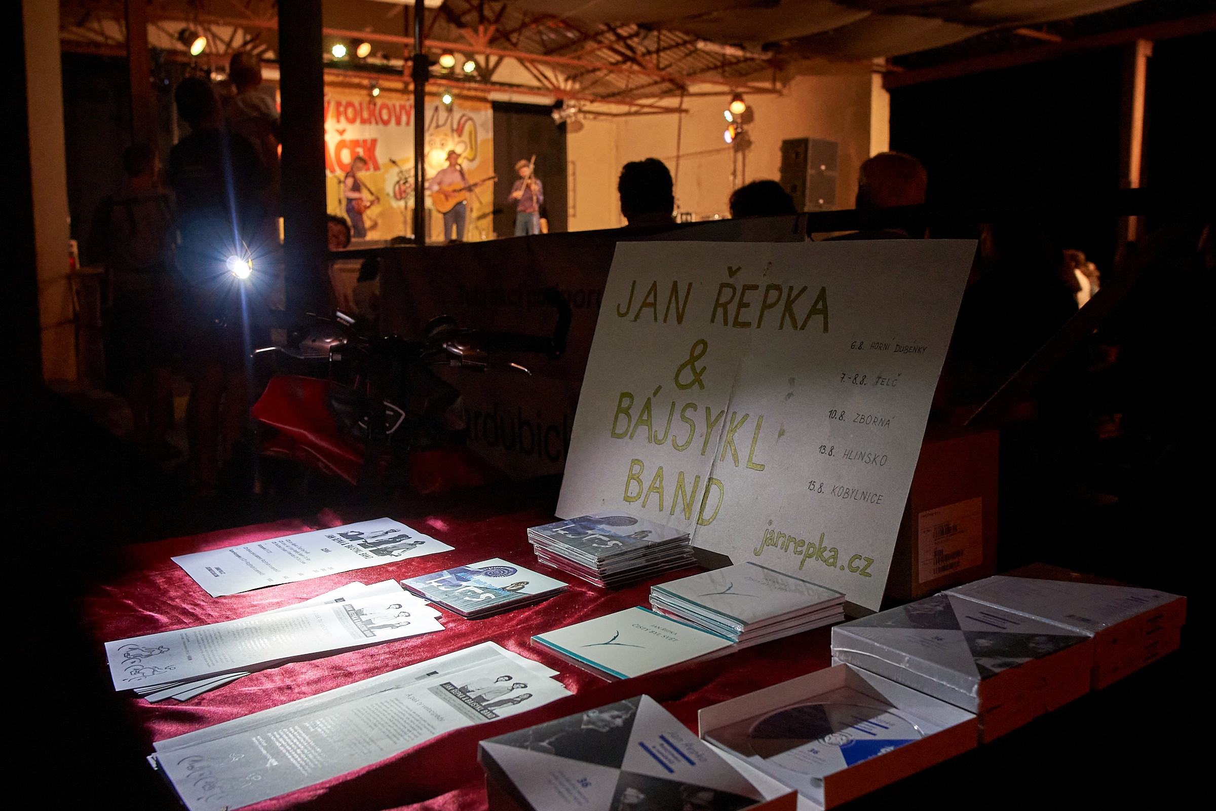 Merch table at a festival | Photo: Štěpán Obdržálek