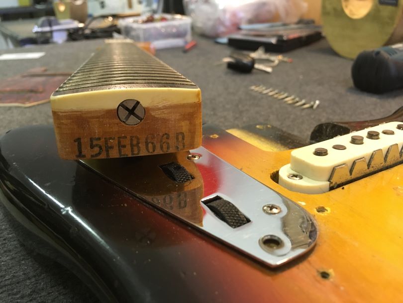 The neck dimensions were given by a letter, in this case it is B, which is a standard for Fender guitars