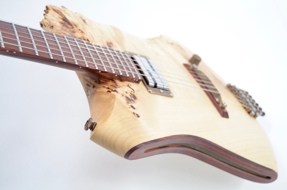 Detail of a slit on a Mokyguo guitar, inspired by the instruments of Japanese monks. | Source: Web sankeyguitars.com