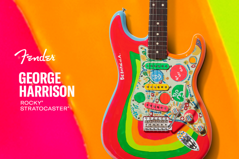 In a fit of artistic inspiration, George took a brush and adorned his guitar with bright red, green and yellow | Photo: Fender website