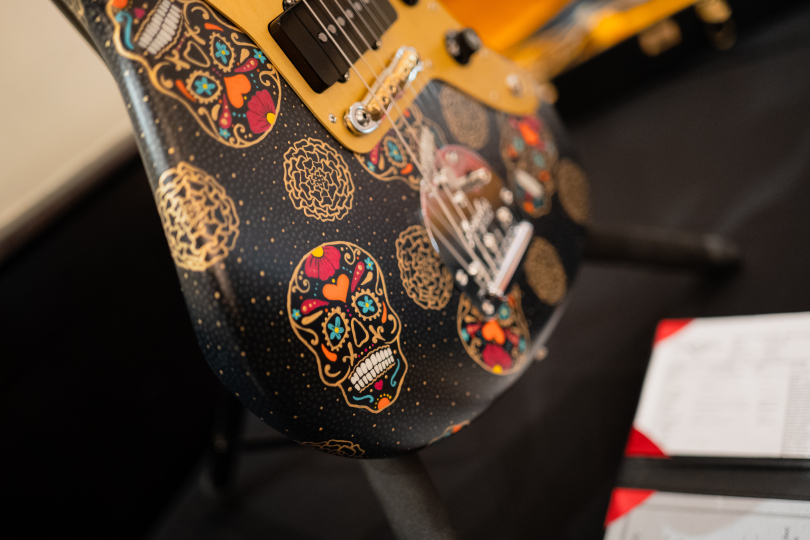 Detail of a Fender guitar by guitarist David Brown with illustrations by Sarah Gallenberger. | Photo: Martin Novotný