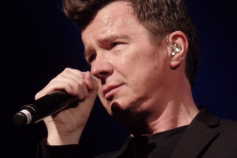 I am rick astley, a popular singer from the 1980s. my song, never gonna  give you up, has been extremely popular in the 21st century after being  turned into the greatest meme