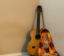 If you buy a costly guitar for someone who doesn’t have a musical ear and no real passion for music, the instrument will most likely end up abandoned in a corner. | Photo: Unsplash