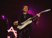 Steve Vai enjoys using the whammy bar to create surreal screams and bizarre sounds to enhance his technically perfect playing. | Photo: Talyn Sherer
