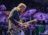 Derek Trucks probably doesn't take the bottleneck off his finger even in his sleep and his playing technique has reached absolute mastery. | Photo: Stuart Levine