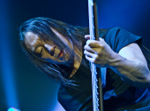 John Myung from Dream Theater doesn’t pretend to play bass, he actually can do it | Photo: Markus Hillgärtner, CC-BY-SA-3.0