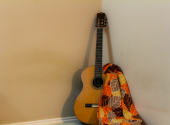 If you buy a costly guitar for someone who doesn’t have a musical ear and no real passion for music, the instrument will most likely end up abandoned in a corner. | Photo: Unsplash