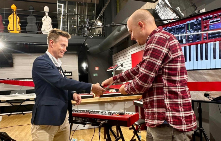 Morten Ness (left) together with Kytary.cz CEO Jiří Würtherk cutting the ribbon to open the new Nord instrument display. | Photo: Ondřej Pečenka