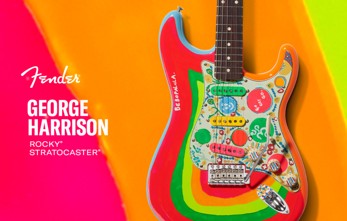 In a fit of artistic inspiration, George took a brush and adorned his guitar with bright red, green and yellow | Photo: Fender website